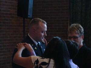 The Kiser family putting the bars on Dad