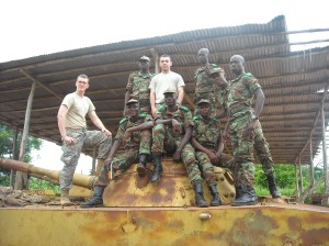 Benin Army Cadets and my teaching partner Brad Fratangelo (Pennsylvania State University) on top of a training tank.